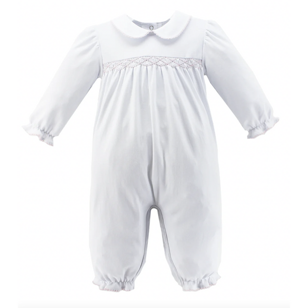 Classic style white knit bubble with pink smocking and long sleeves. Zuccini kids audrey bubble, white knit.