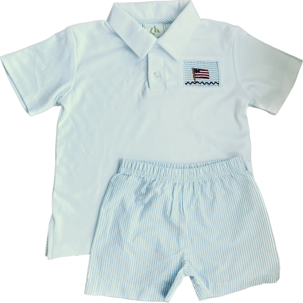 White polo with flag embroidery and coorinating blue and white seersucker woven shorts. Perfect boy's outift for 4th of July or other patriotic occasions!