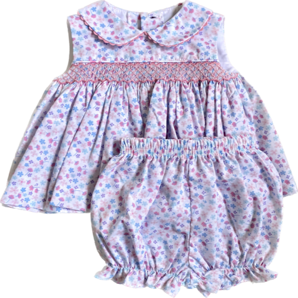 Smocked floral bloomer set with pink smocking and trim.