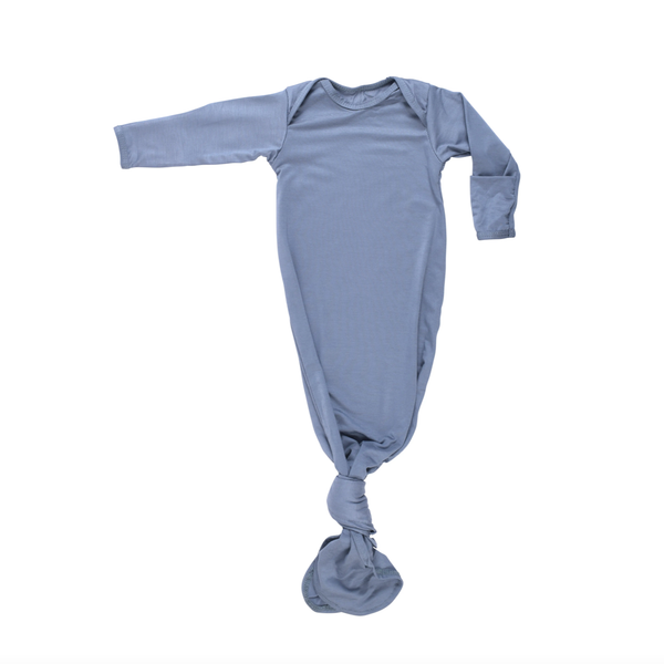 Steel blue knotted baby gown. This baby gown has super soft fabric, fold-over cuffs to prevent scratching, and the tie bottom makes middle of the night diaper changes so much easier.