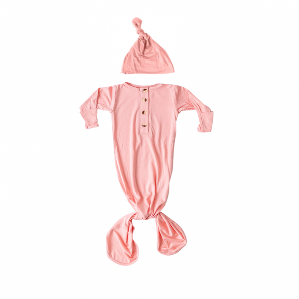 Stroller Society super soft pink baby gown and hat set. Features matching mat, fold-over cuffs, and working buttons for easy on/off.