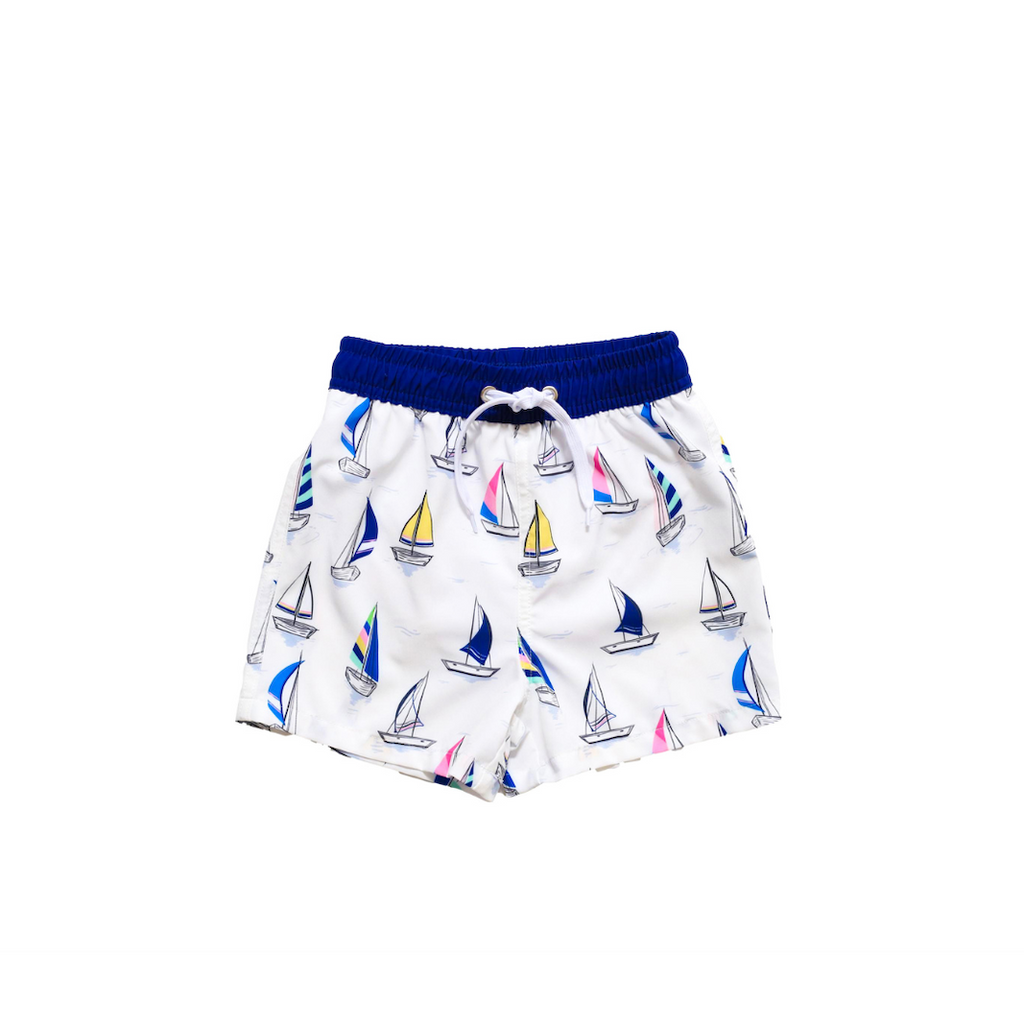 Boys sailboat swim trunks with colorful sailboats and navy waistband