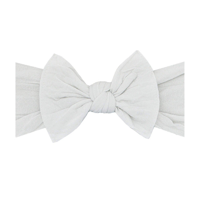 Light grey baby bling bow headband. The cutest and most comfortable baby bows that don't leave marks on her head! 