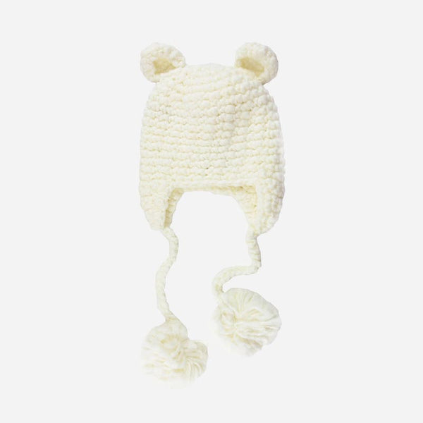 Cream colored hand-knit hat with bear ears. Features cute tassel detail
