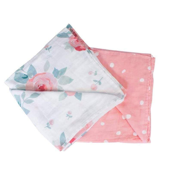 Muslin swaddle two pack. Features large floral print and pink with dot pattern