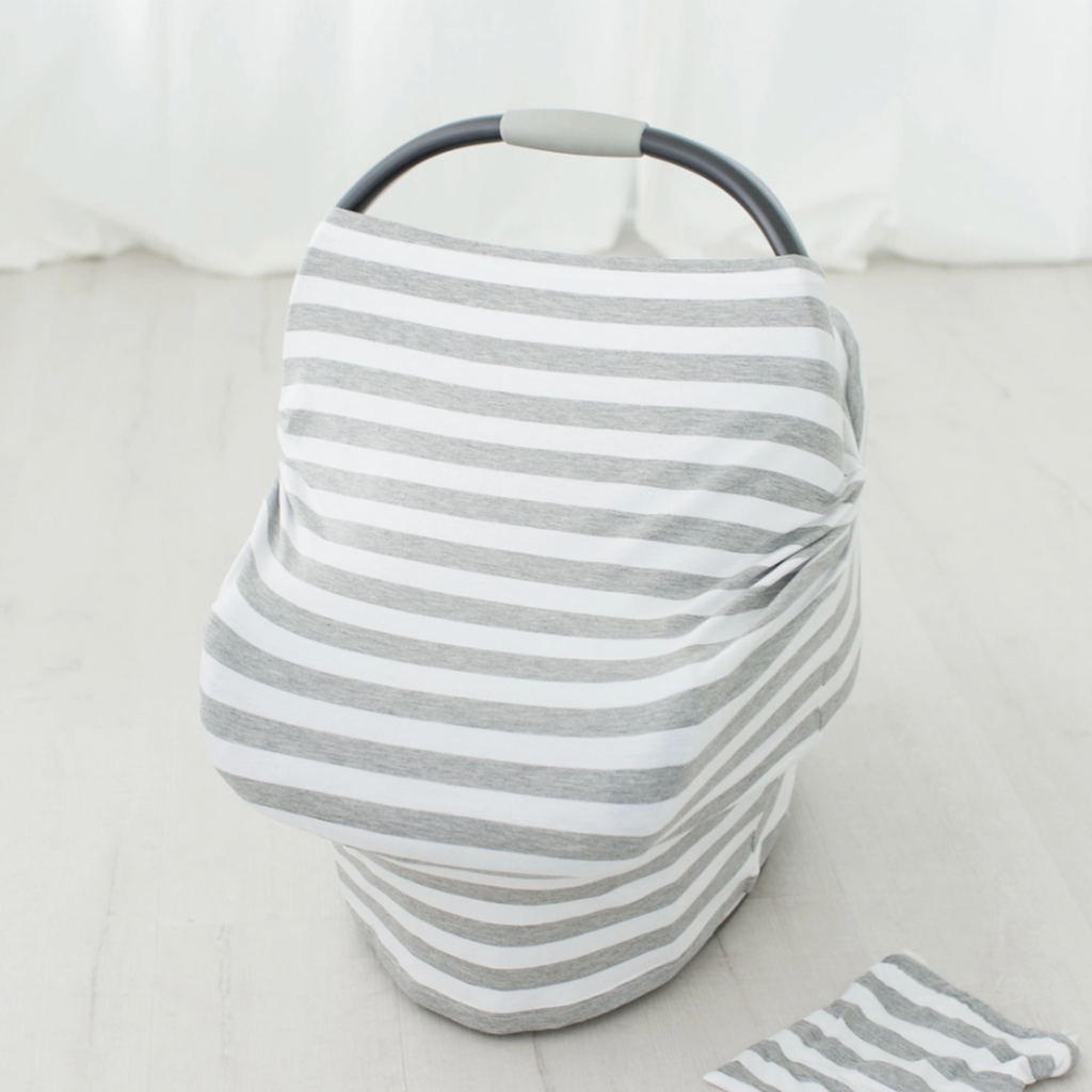 Grey and white stripe multi-purpose cover. This is great for a carseat cover, shopping cart cover, high chair cover, nursing/breastfeeing cover, and anything in between. Perfect gift for new moms, a diaper bag essential. 