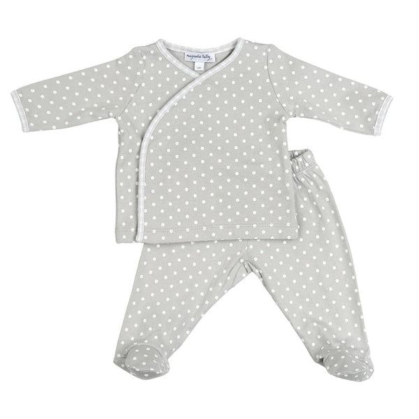 Magnolia Baby 2 piece baby set with footed pants and cross-over long sleeve top. Features 100% pima cotton fabric and silver and white dot print. Perfect coming home outfit! 