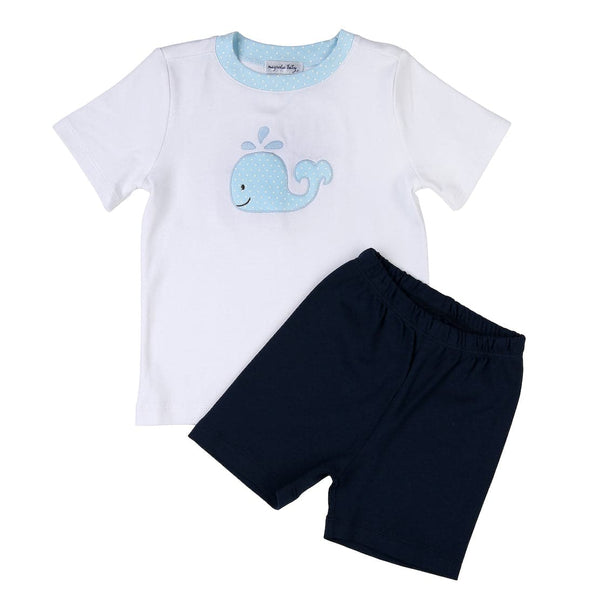 100% pima cotton baby and toddler boys short set. Navy blue shorts and white shirt with light blue whale applique on shirt. Shirt collar features a matching light blue accent. 