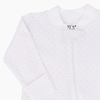 100% pima baby footie pajamas with zipper. These baby zipper pajamas have fabric is white with small light pink dots. 